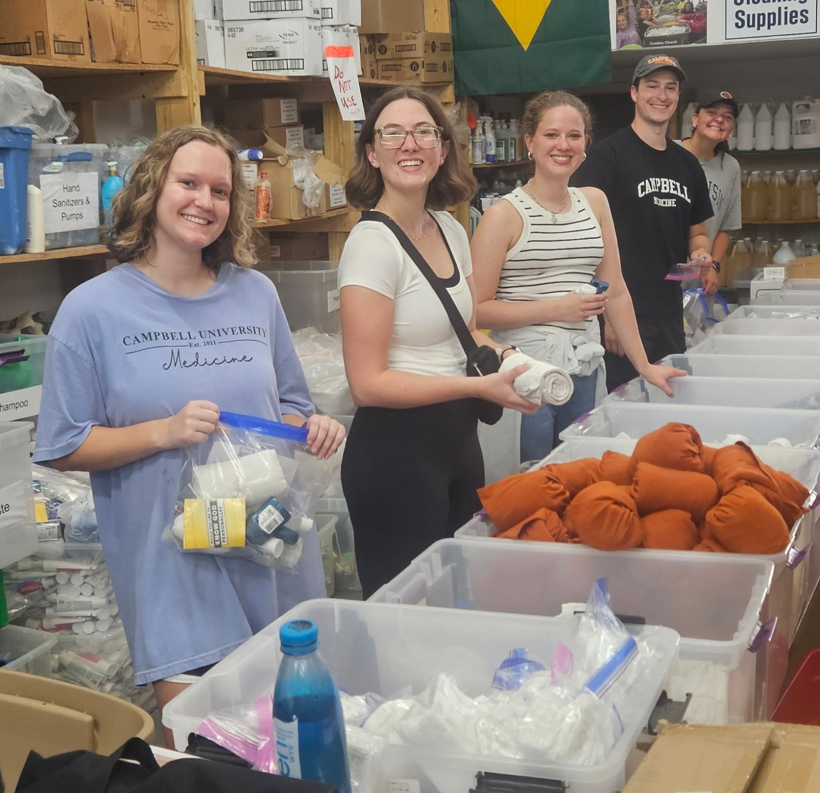 Picture of women making hygiene kits
